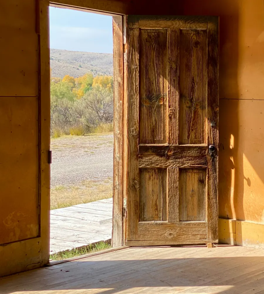 Golden light through an open doorway